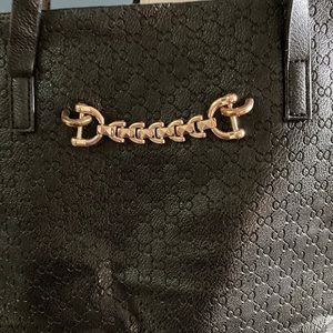 Simi 2 in 1 tote and handbag. Black vegan leather. 1 large tote plus 1 zip bag